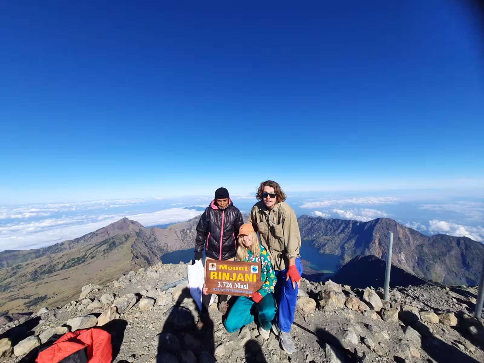 Climbers reaching the 3,726m summit of Mount Rinjani via the Senaru route at sunrise