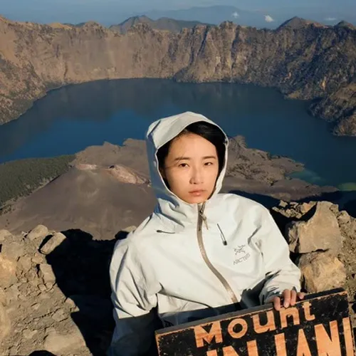 View of Mount Rinjani, famous for its 4-day hike via Sembalun, featuring the impressive summit against a clear sky View of Mount Rinjani, famous for its 4-day hike via Sembalun, featuring the impressive summit against a clear sky